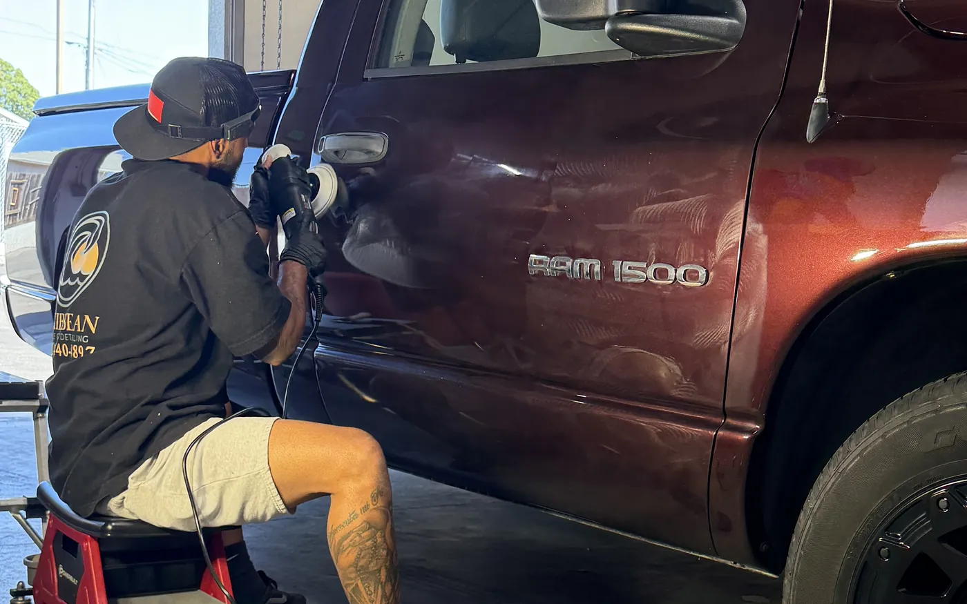 Gustavo machine polishing a Ram 1500 on location